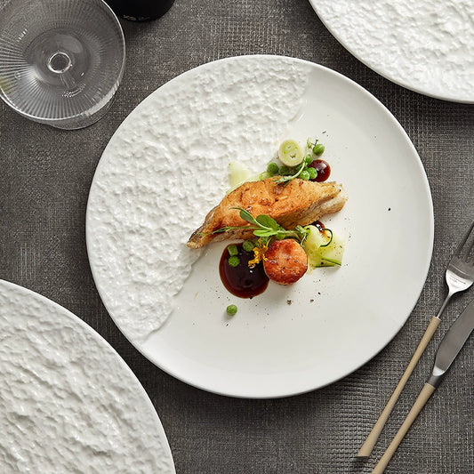 Modern round plate featuring smooth and hammered contrast


