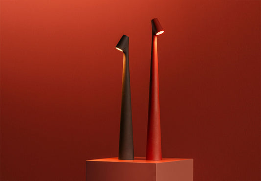 Modern sculptural bedside lamp adding warmth and visual depth to any space

