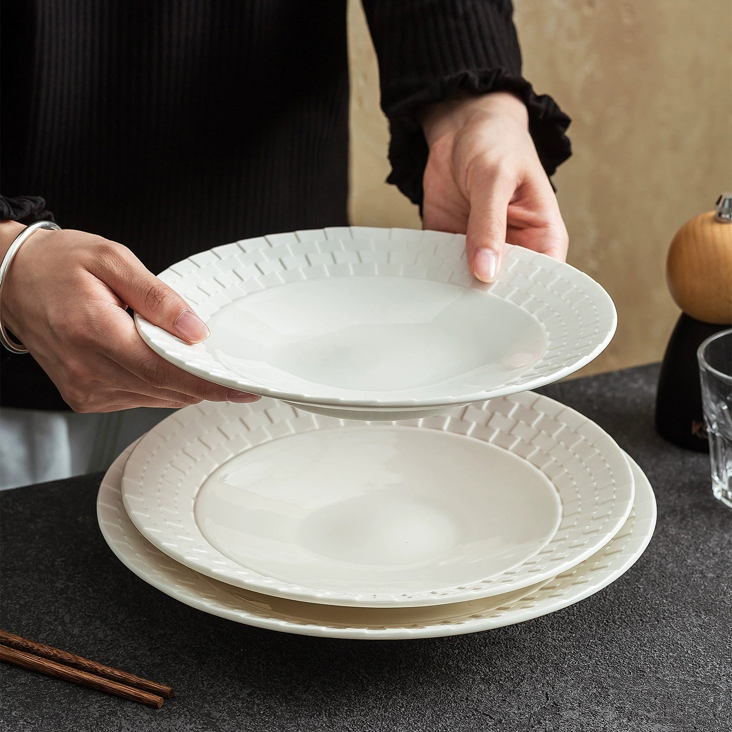 Modern shallow plate with woven relief rim for refined plating