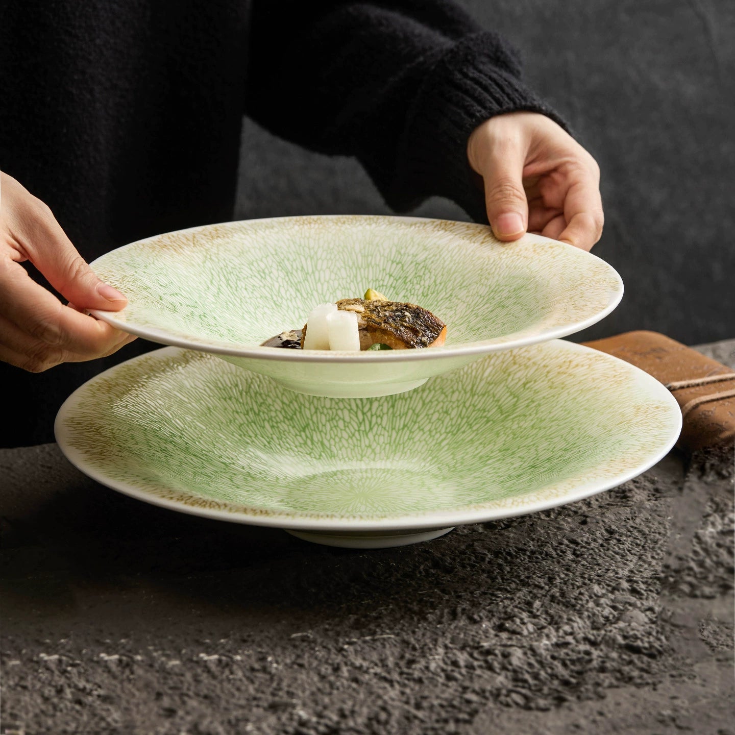 Deep rim ceramic bowl used for refined food styling