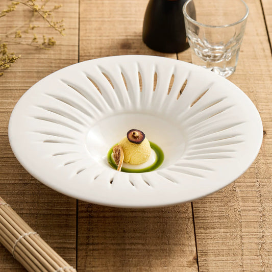 Moonlight white zenith carved petal plate with 10-inch diameter for fine dining.