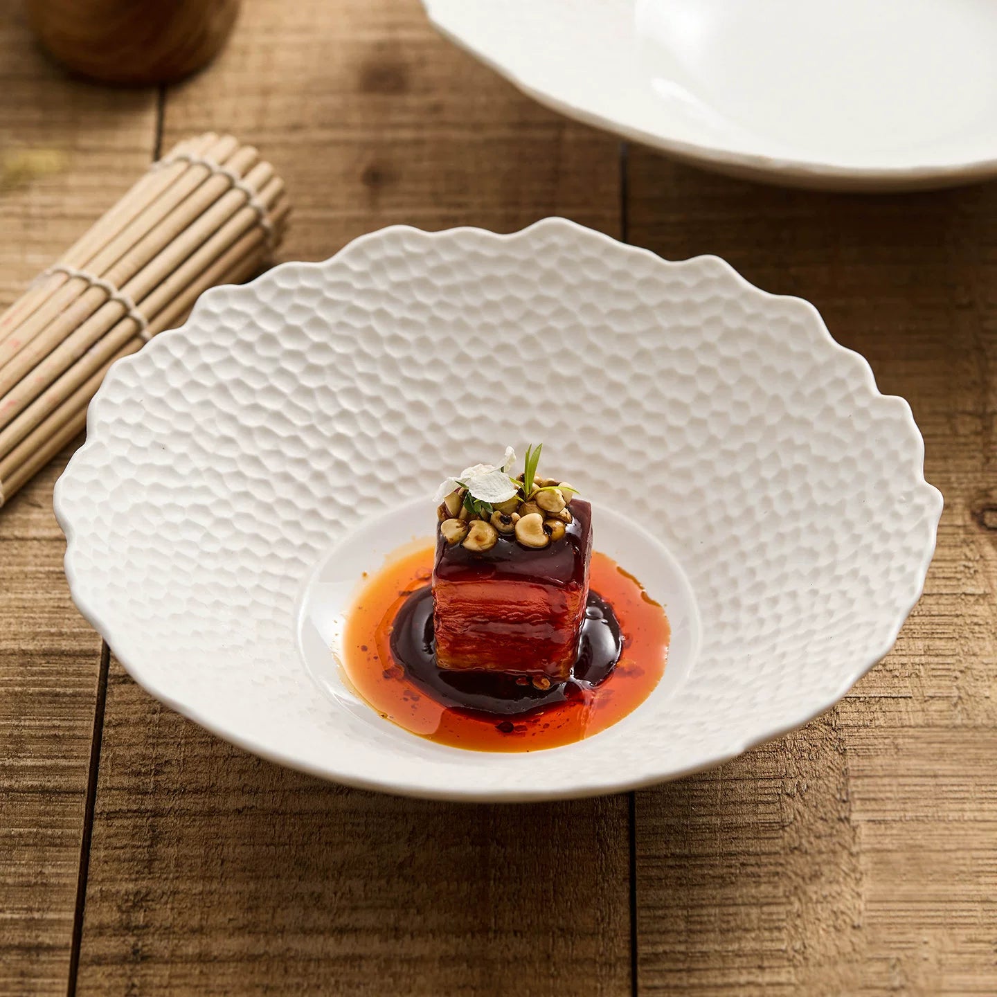 Off-white matte lattice textured bowl with scalloped artisanal rim.