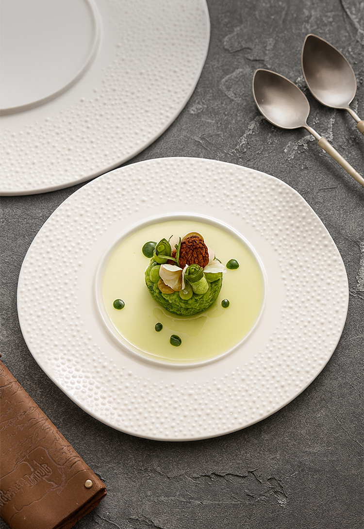 Organic form porcelain plate with soft rim