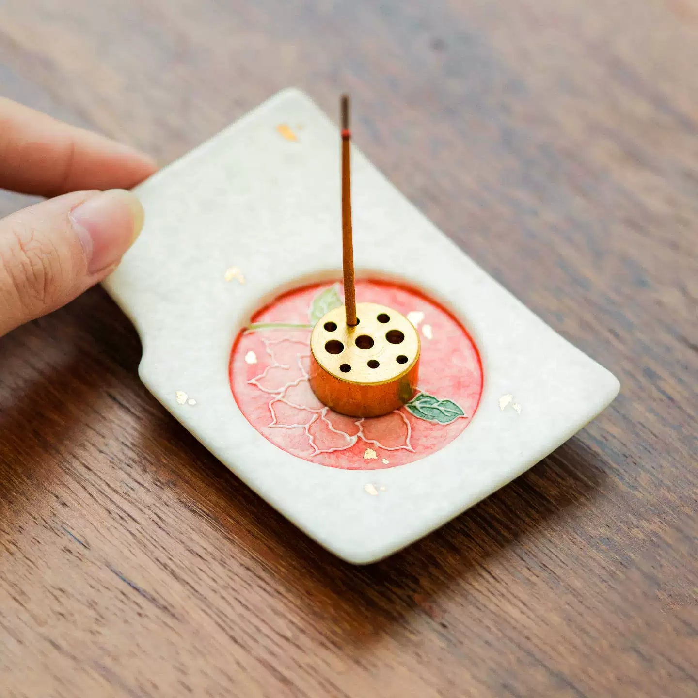Oriental style ceramic incense burner with lotus and gold accents