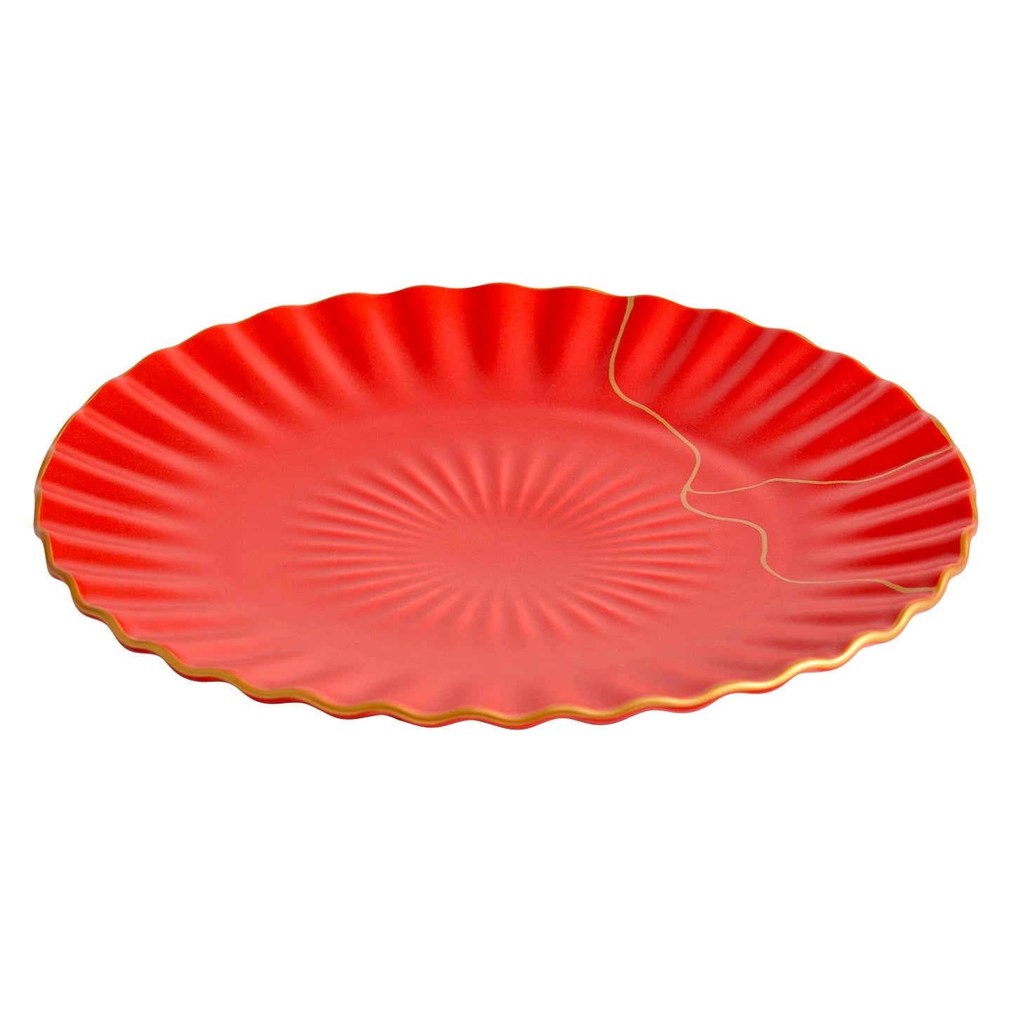 Red decorative plate with gold rim on a white background