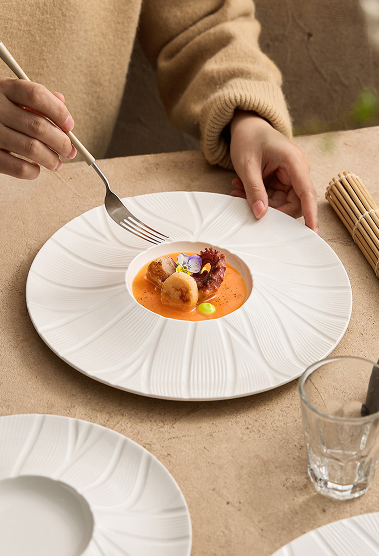 Petalwave porcelain captures movement and light in form.