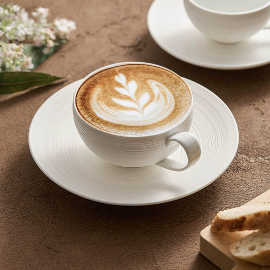 Porcelain coffee cup and saucer with spiral texture

