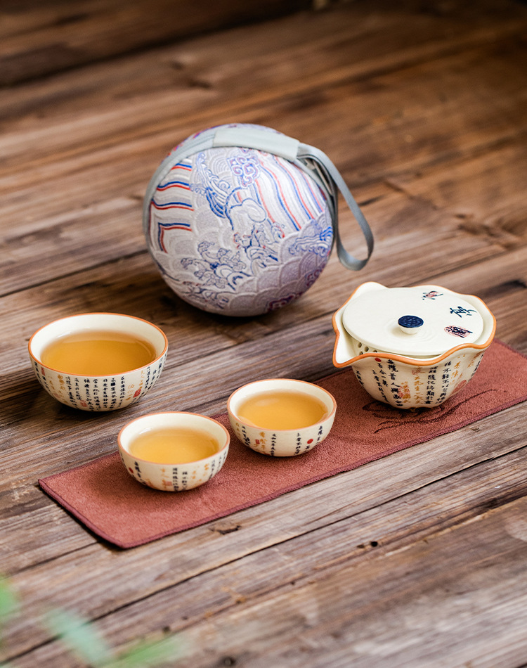 Portable Chinese tea brewing set with calligraphy design