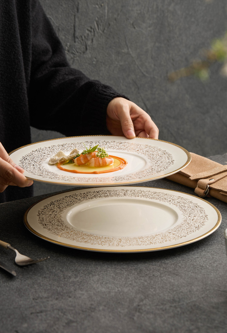 Premium ceramic plate with artistic gold pattern