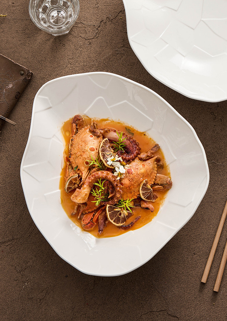 Professional-grade white porcelain bowl with a heavyweight, premium feel.