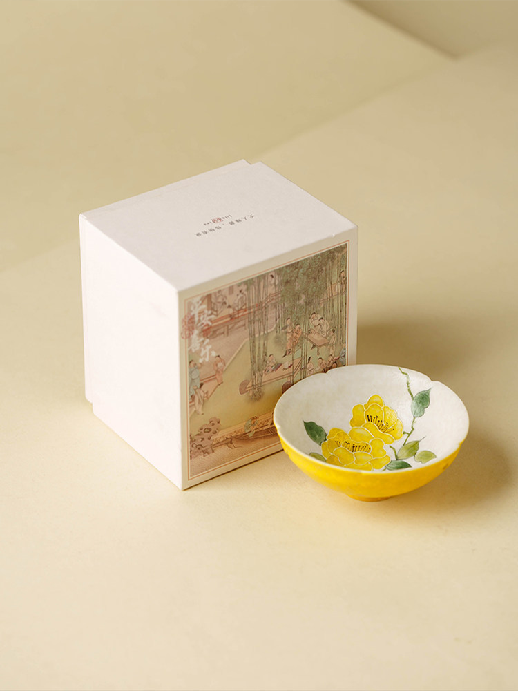Professional tea set component featuring heritage blossom hand-painting.