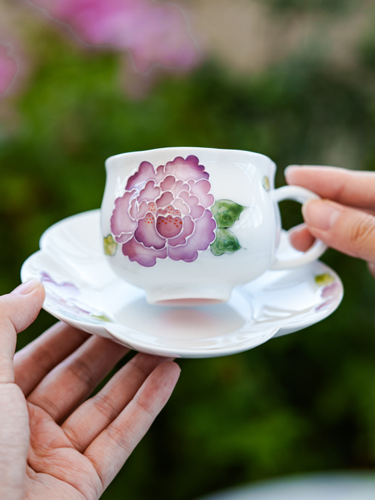 Purple peony porcelain teacup symbolizing grace and tranquility
