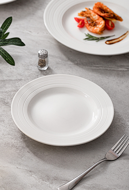 Refined shallow ceramic plate designed for modern culinary presentation