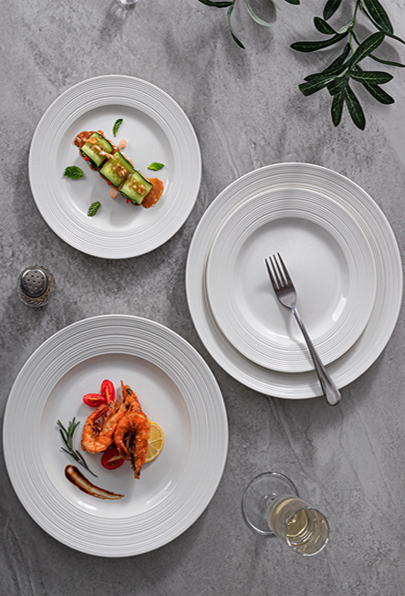 Sculptural shallow ceramic plate for refined dining experiences