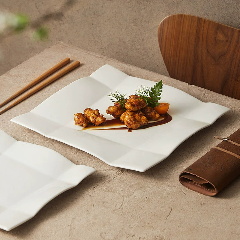 Sculptural square plate designed for modern food styling