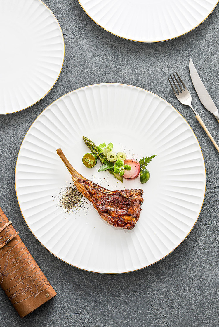 Sculptural white pleated dinner plate for stylish home dining