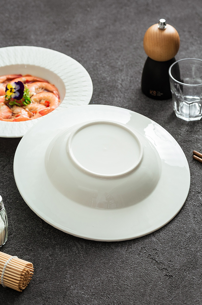 Sculptural wide soup plate designed for refined dining experiences