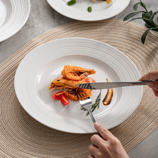 Shallow plate with concentric ribbed texture for refined plating