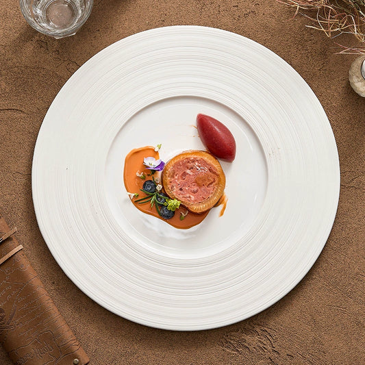 Shallow white plate for fine dining or plated desserts

