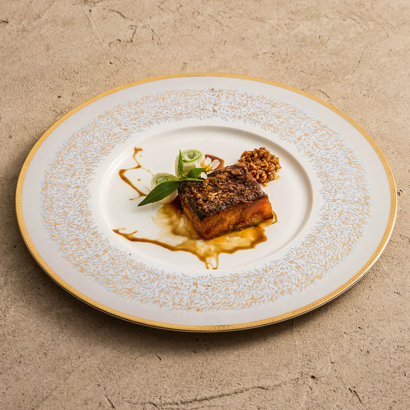 Sky-blue wide-rim porcelain plate with hand-painted gold detailing