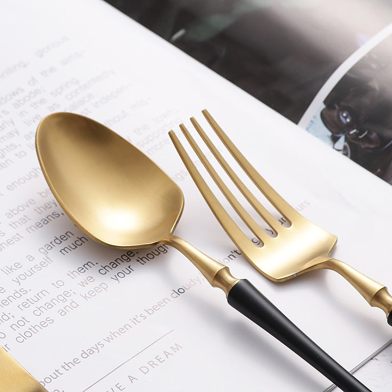 Stylish Western cutlery set on marble table background

