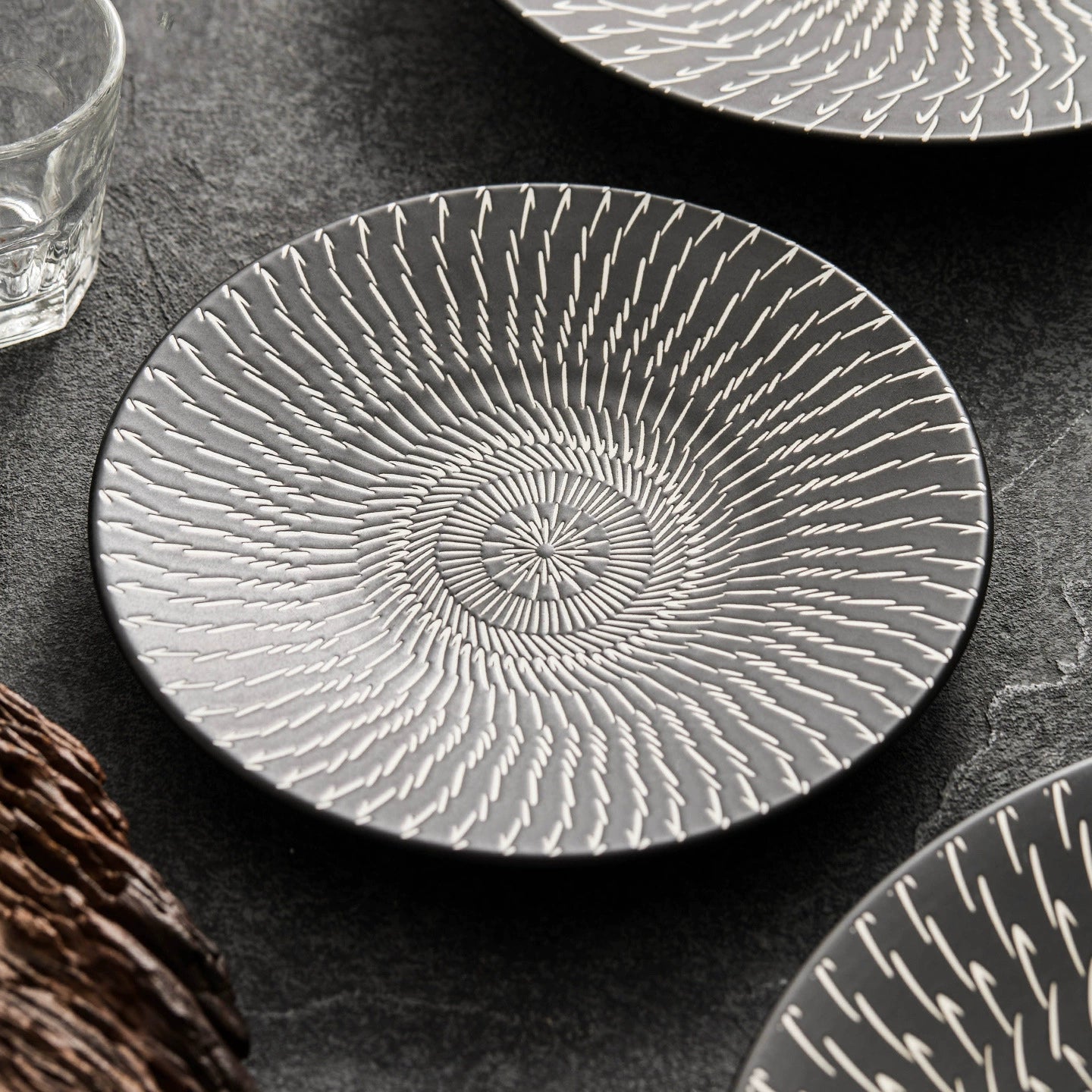 Textured ceramic dish perfect for steak, sushi, or dessert plating