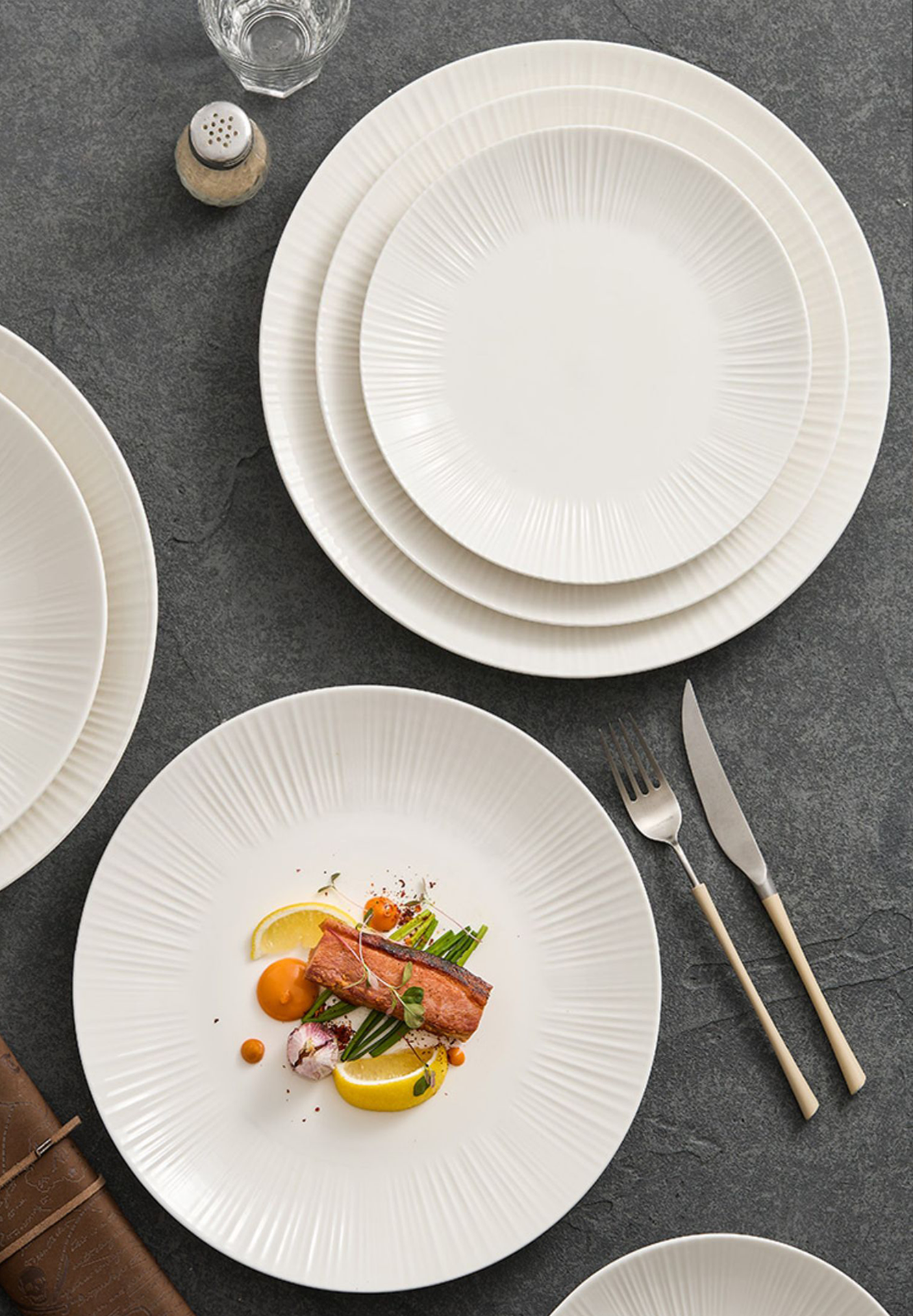 Textured ivory white plate highlighting artisanal craftsmanship.