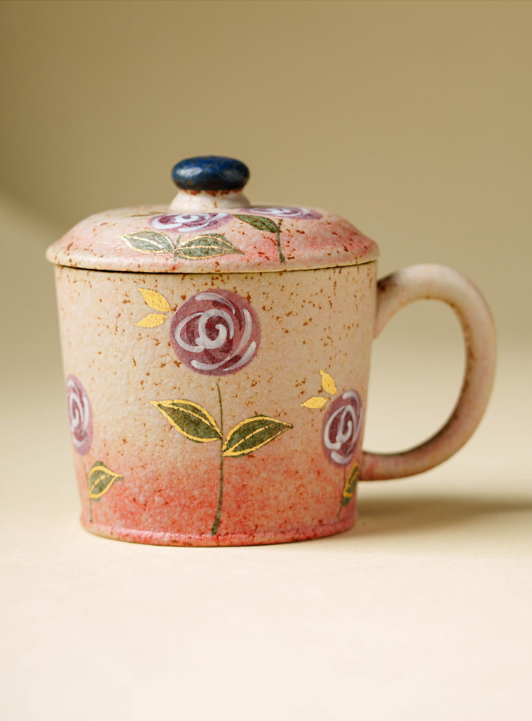 Vintage-inspired floral ceramic coffee mug for home or café use