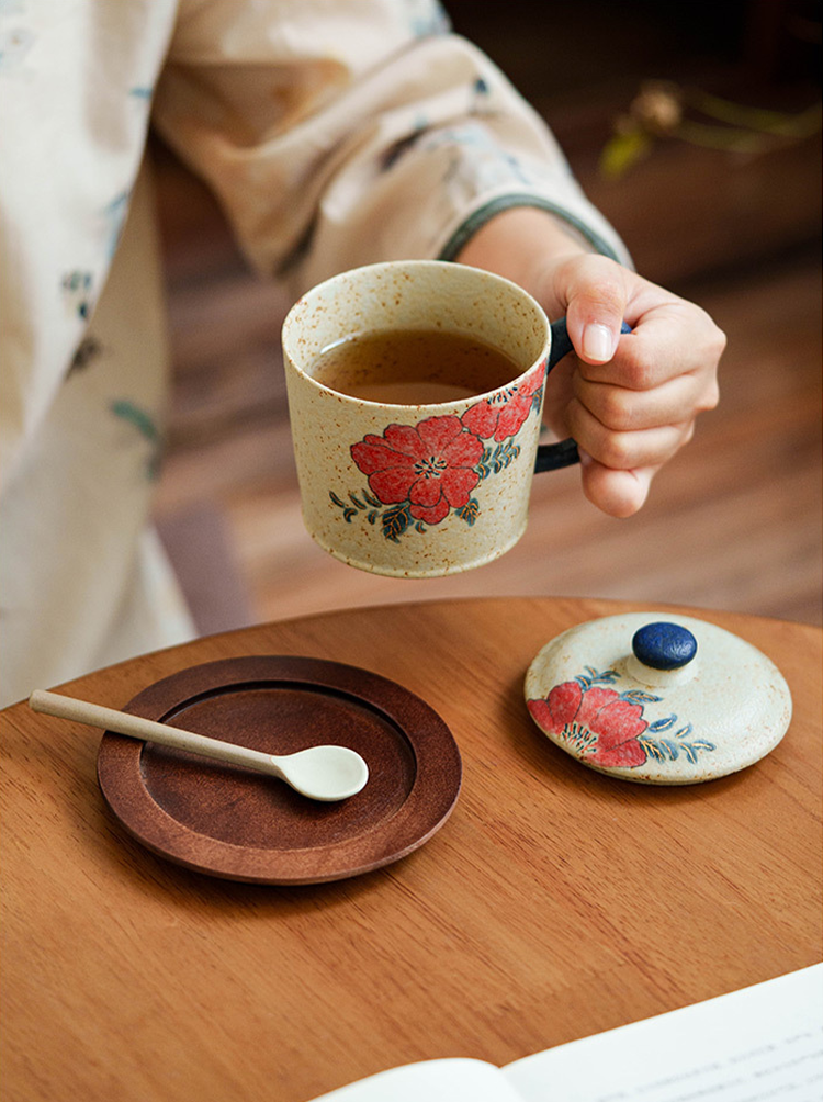 Vintage-style ceramic mug with wooden coaster