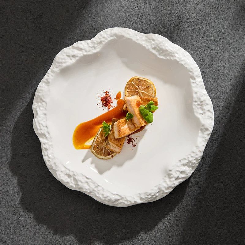 White irregular edge ceramic dinner plate with food plating