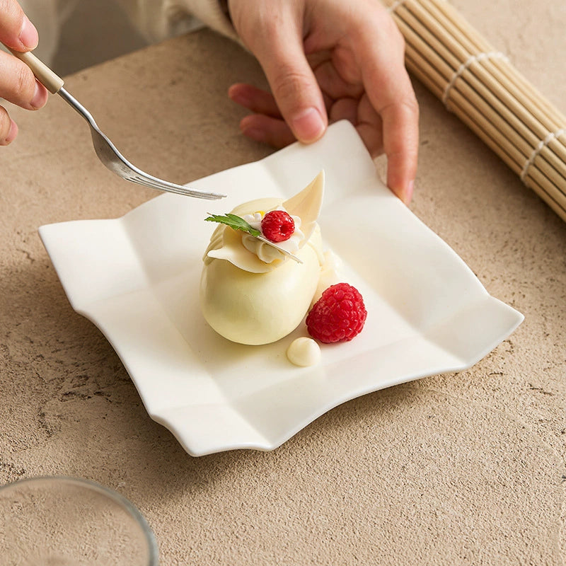 White matte square dish with soft raised edges