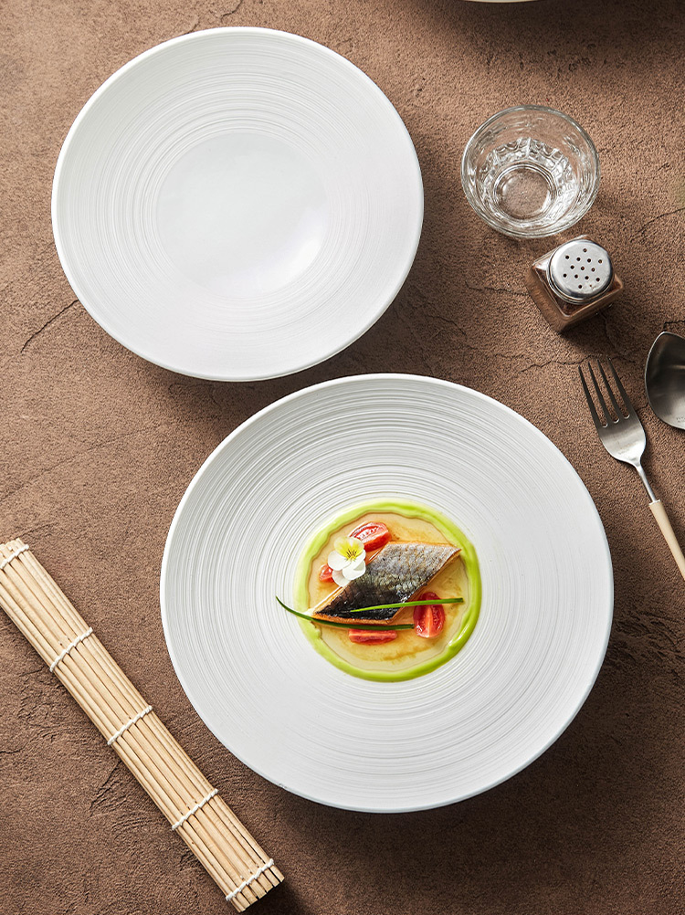 Wide-rim ceramic bowl with textured detailing for creative dishes
