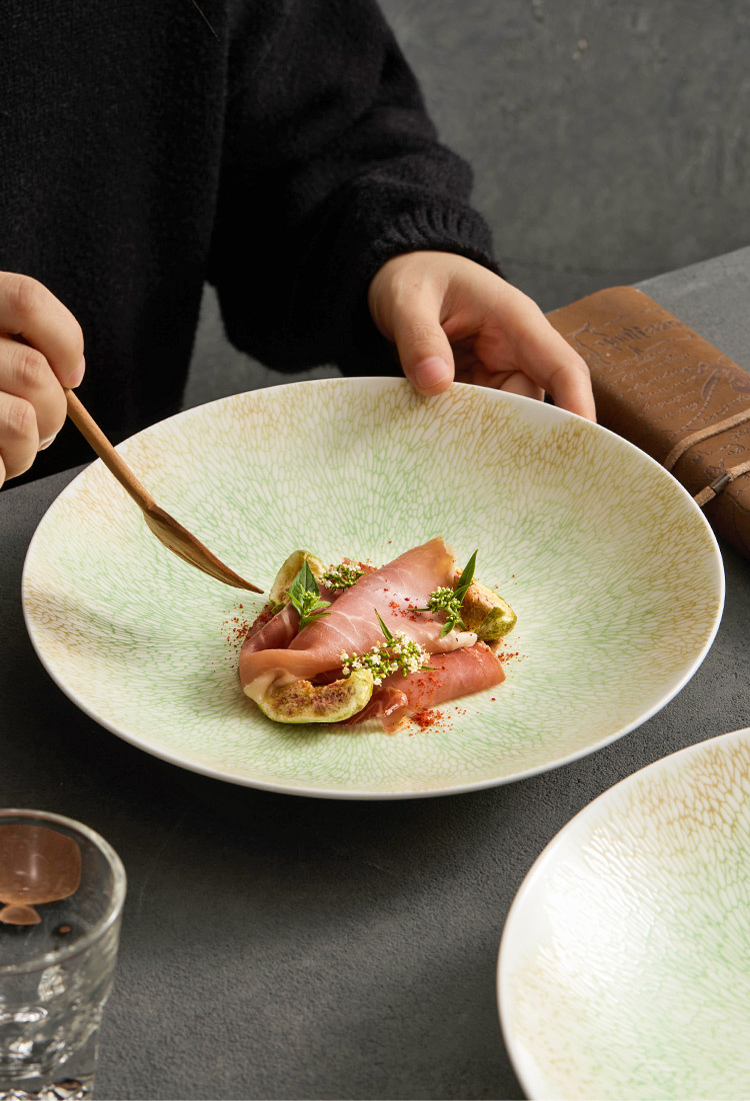 Wide shallow dining bowl suitable for seafood and appetizers