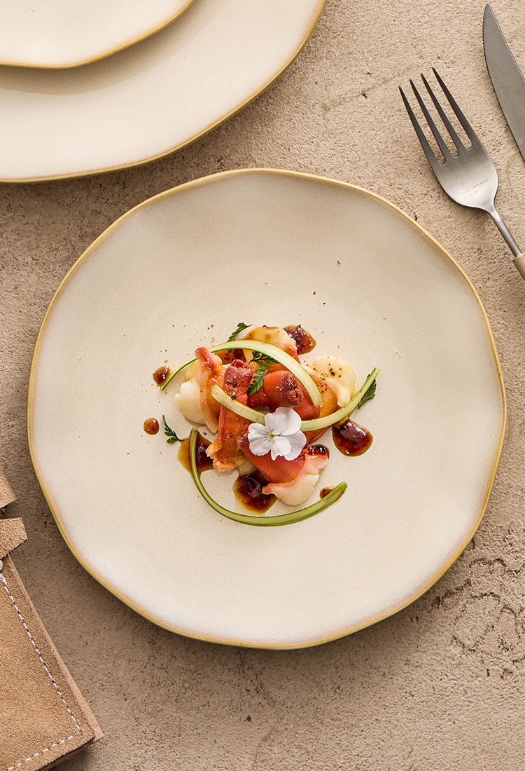 Zen-inspired tableware with a warm sand-colored glaze that evokes a sense of quiet luxury and calm.