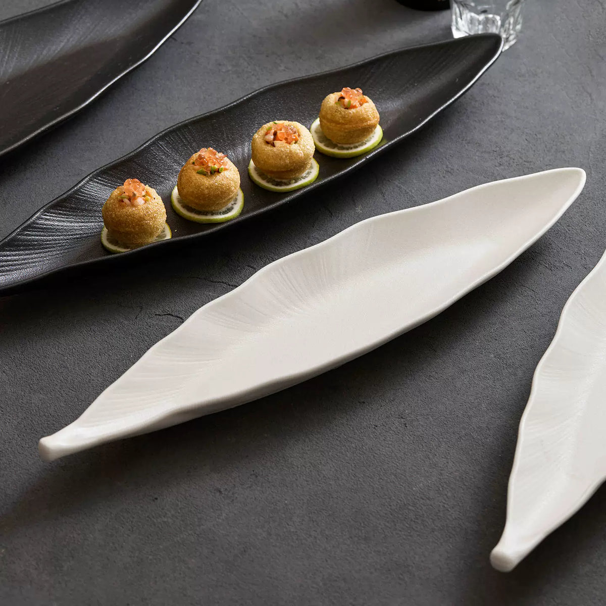artisanal leaf vein textured long ceramic platter in black and white