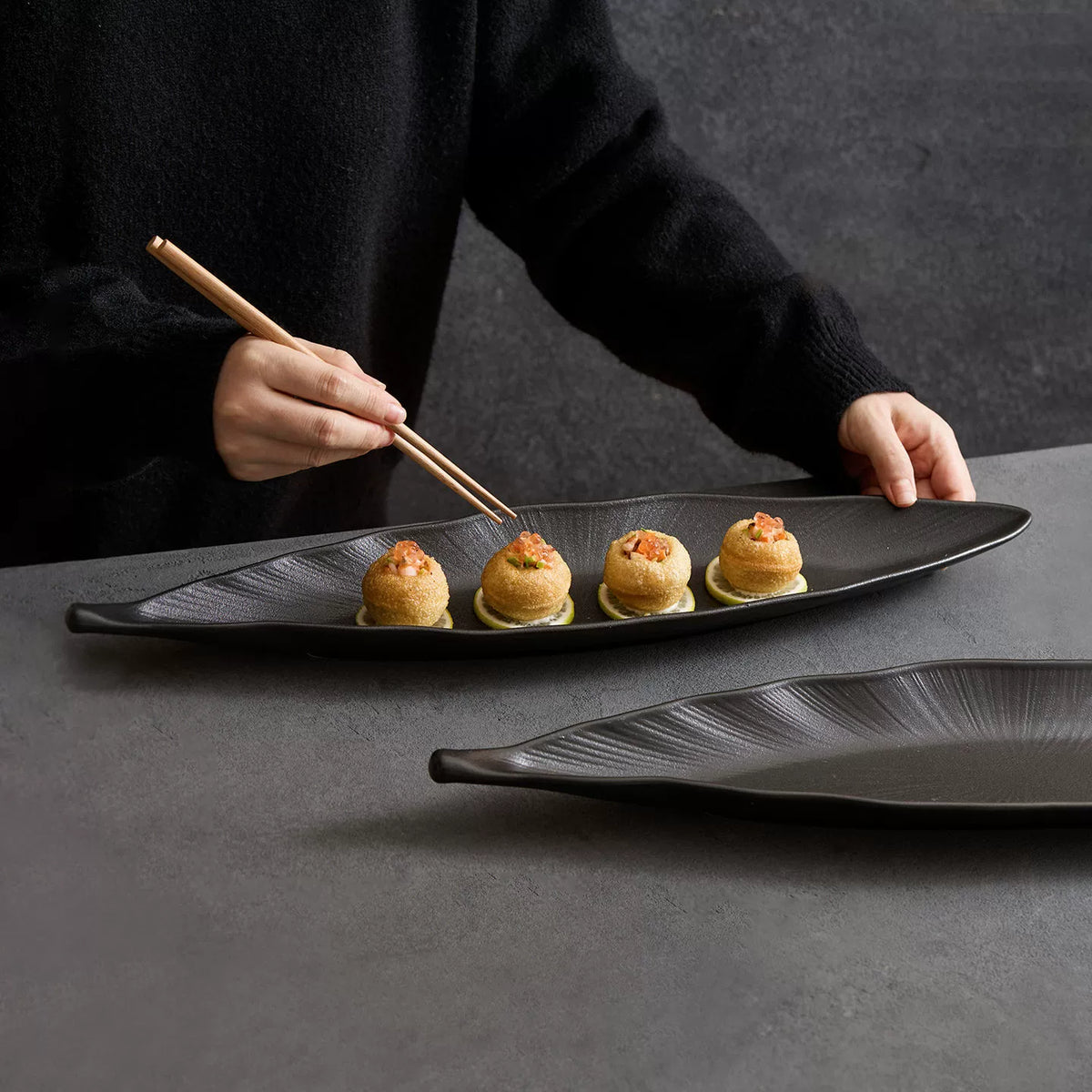 black botanical leaf appetizer tray for fine dining starters