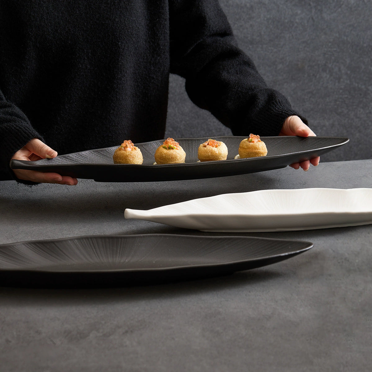 black matte leaf ceramic dish for sushi and sashimi plating