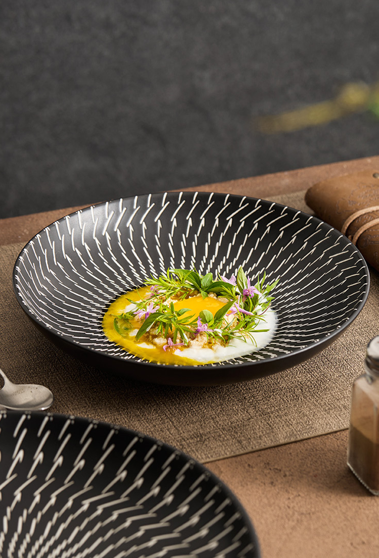 Elegant dish with a decorative pattern on a wooden table