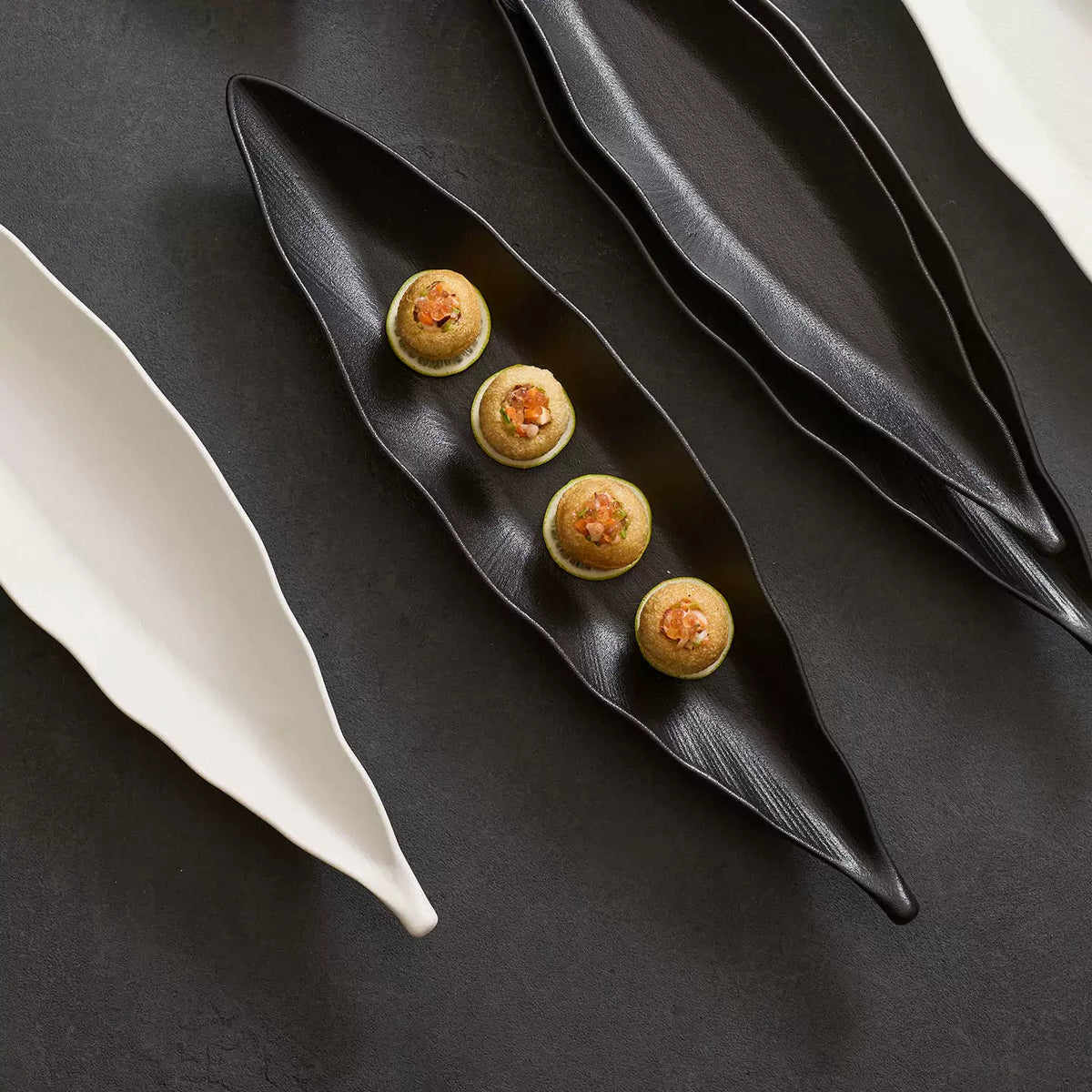 goseung leaf shaped ceramic long platter with bite sized appetizers