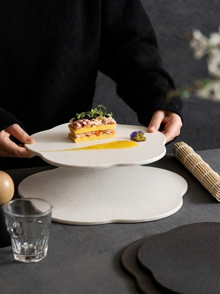 goseung white radial textured plum plate with gourmet food styling