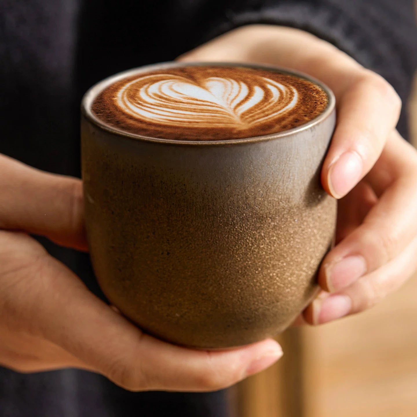 hand textured metallic glaze coffee cups showing unique reactive finish