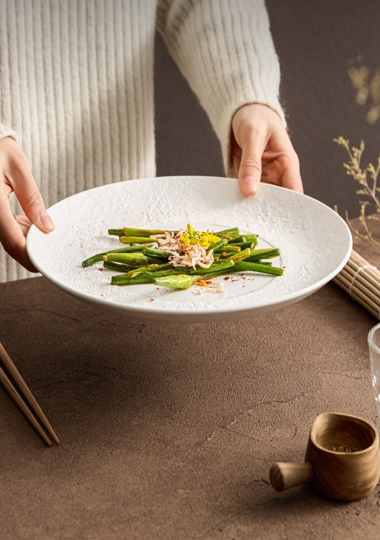 high end tactile ceramic charger plate for upscale table settings