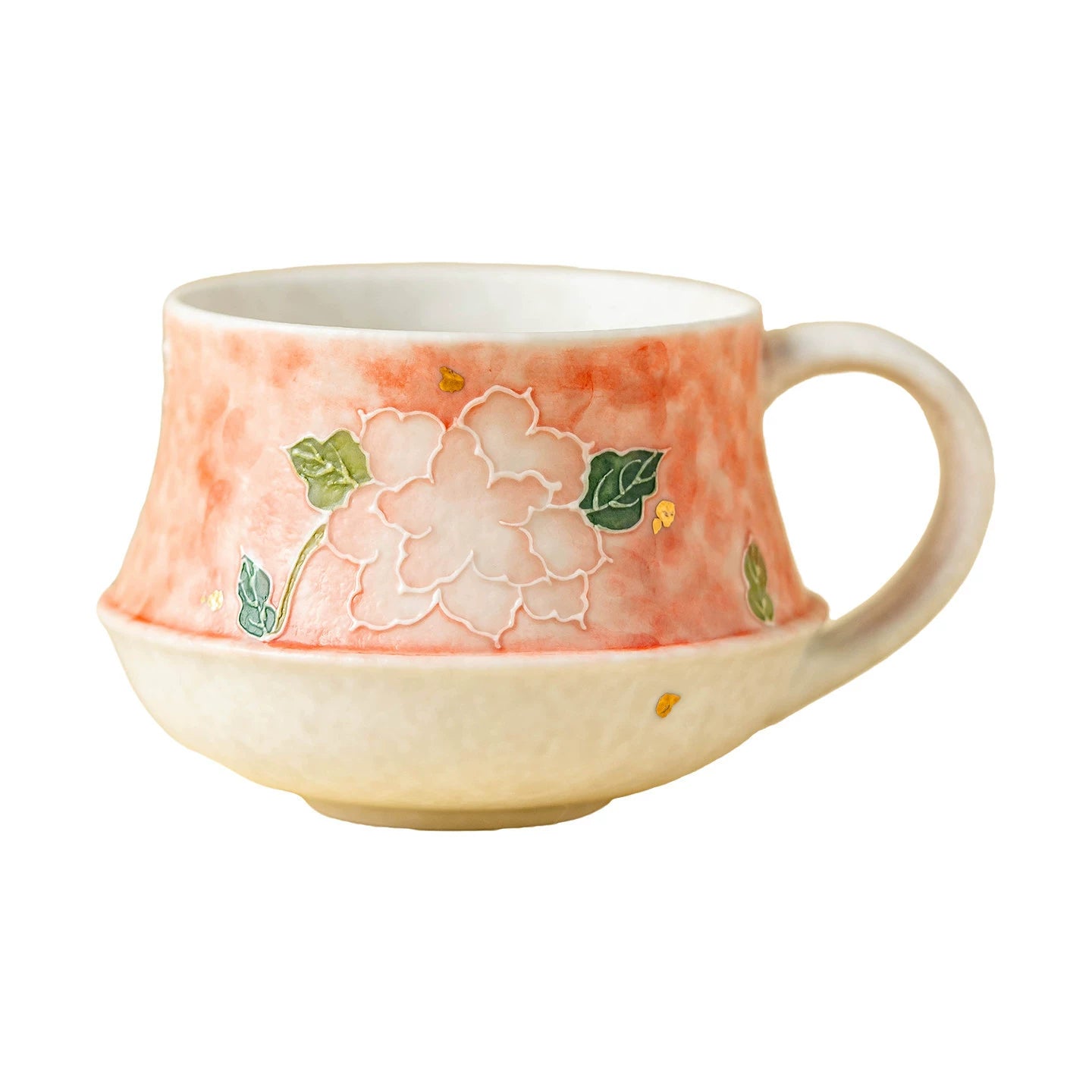 minimalist pink floral ceramic cup on dark wood coaster with spoon