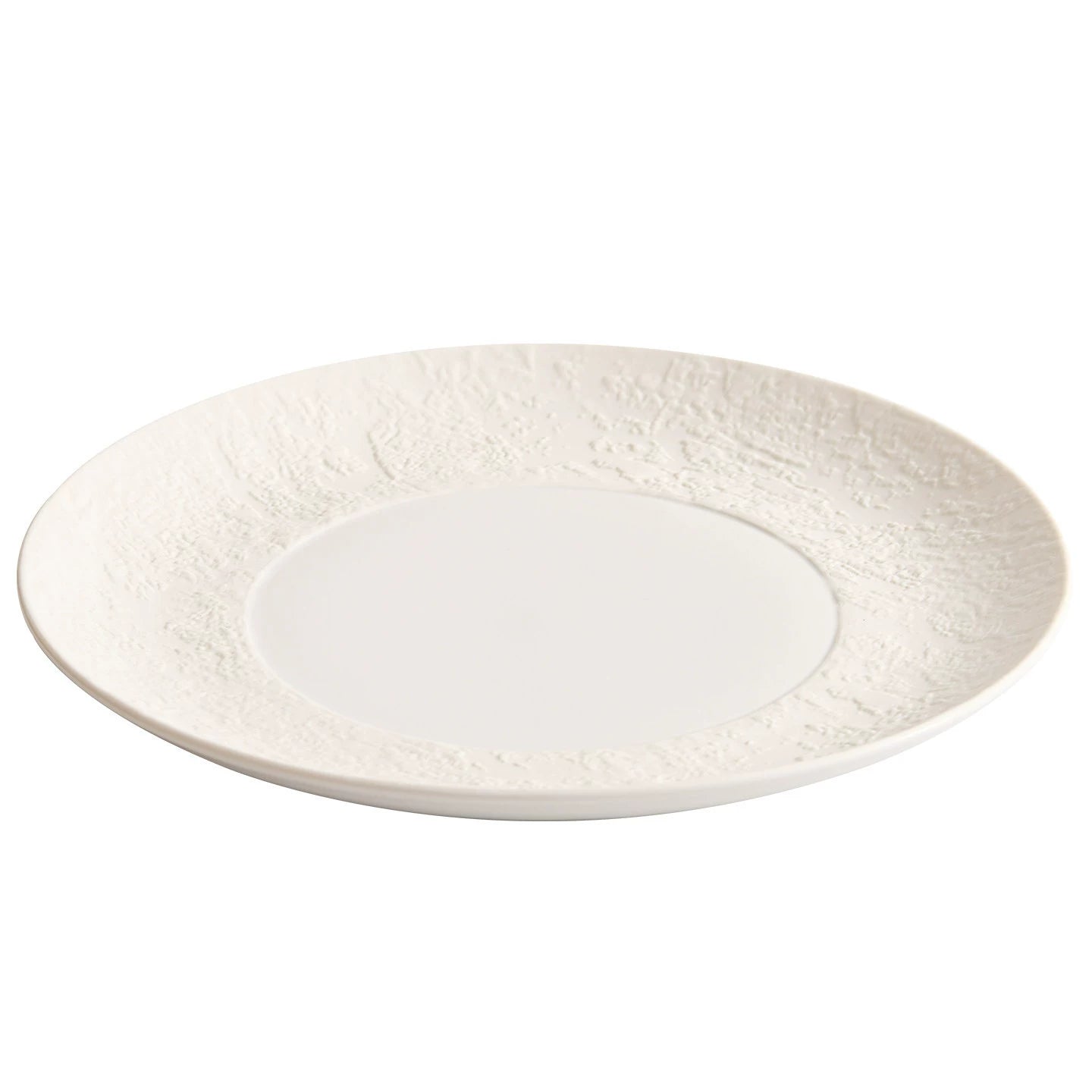 wabi sabi inspired textured white ceramic plate close up details